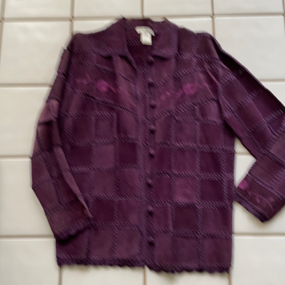 Purple leather jacket with rayon trim and floral accents